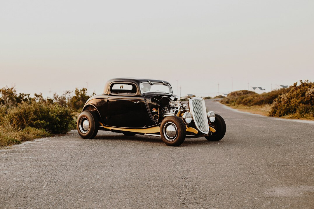 Classic convertible parked near the shoreline in Punta del Este during summer
