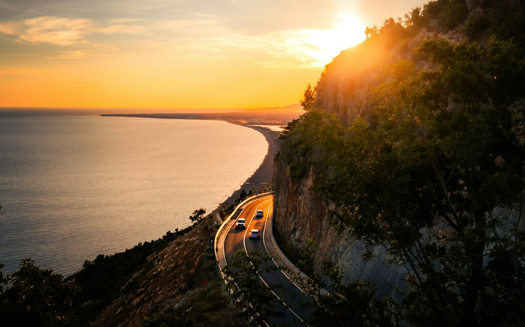 luxury car on coastal highway