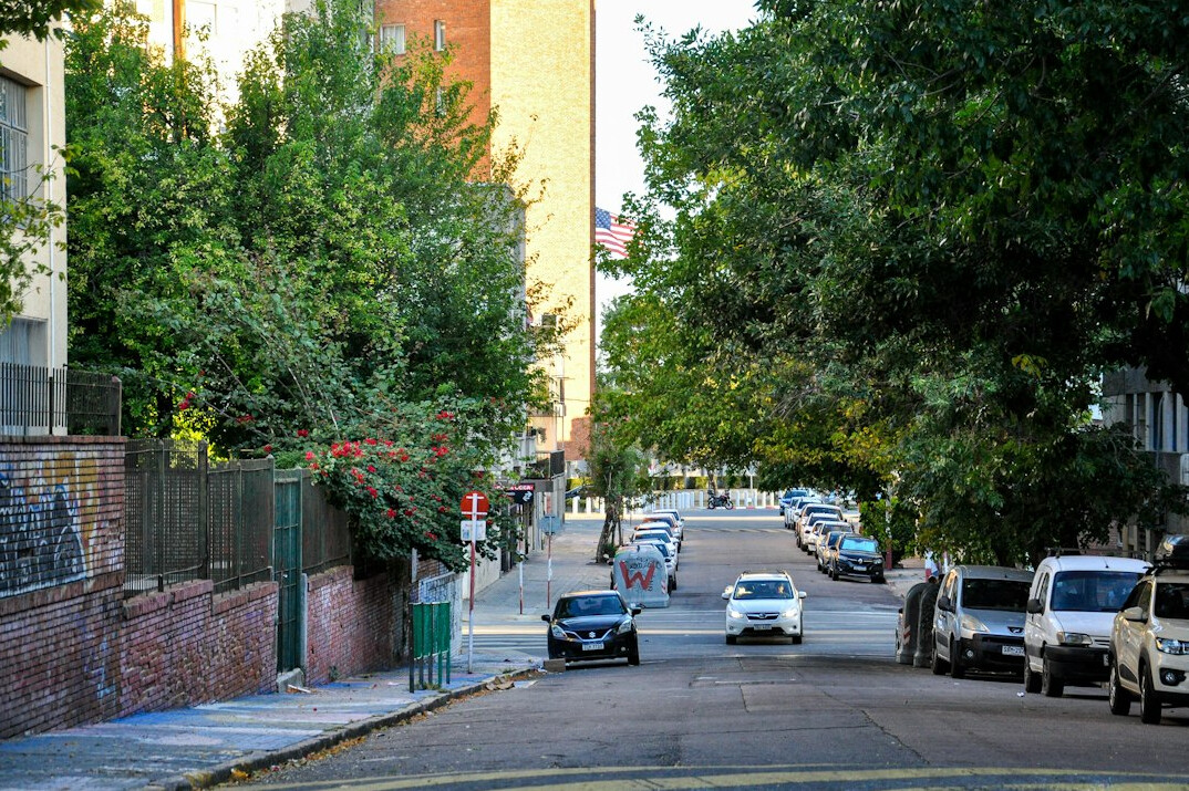 American convertible from the 1960s parked on a quiet Uruguayan street