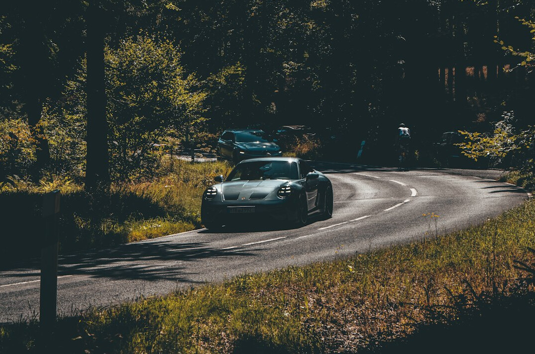 luxury sports car scenic road
